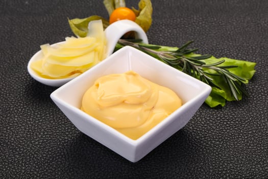 Cheese sauce in the bowl photo