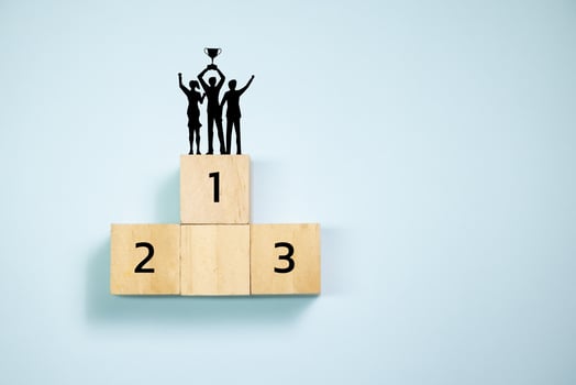Top view people on top of wooden blocks  set  to podium. Concept for success and teamwork. photo