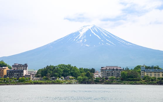 Beautiful Fuji mountain with cloud and blue sky in summer, the famous landmark and attraction place of tourists who have a long holiday in Japan, Lake Kawaguchiko photo