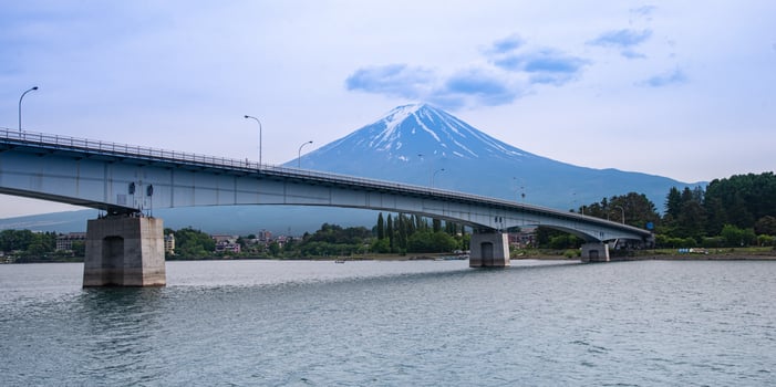 Beautiful Fuji mountain with cloud and blue sky in summer, the famous landmark and attraction place of tourists who have a long holiday in Japan, Lake Kawaguchiko photo