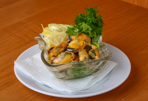 Mussels in butter sauce photo