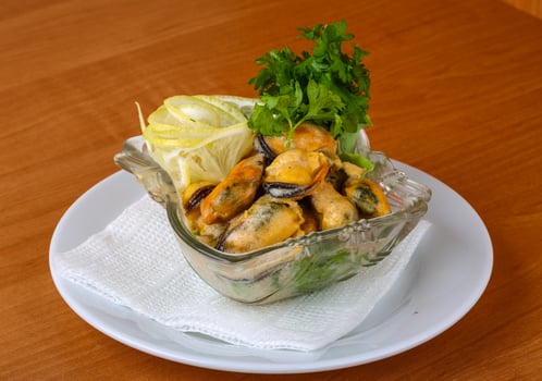 Mussels in butter sauce photo