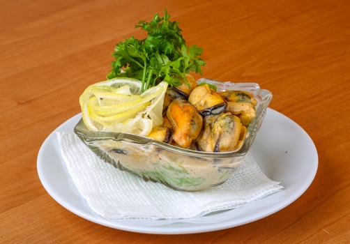 Mussels in butter sauce photo