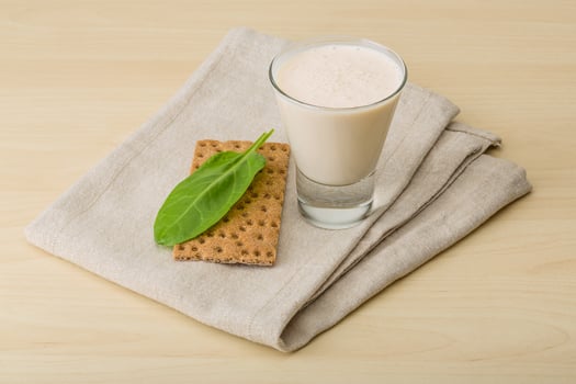 Kefir on wooden background photo