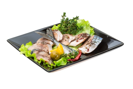 Mackerels on the plate and white background photo