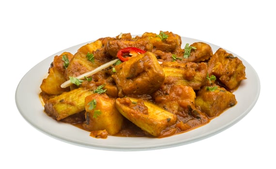 Alu Bengan on the plate and white background photo