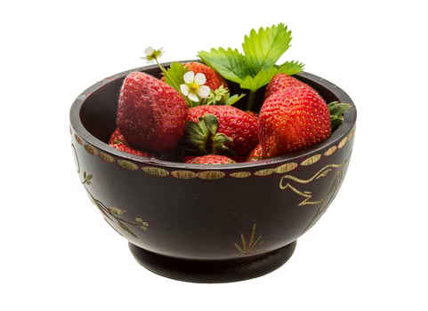 Ripe strawberry in a bowl on white background photo