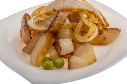 Fried onion on white background photo
