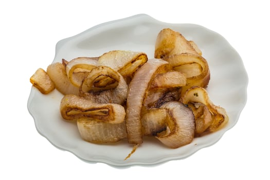 Fried onion on white background photo