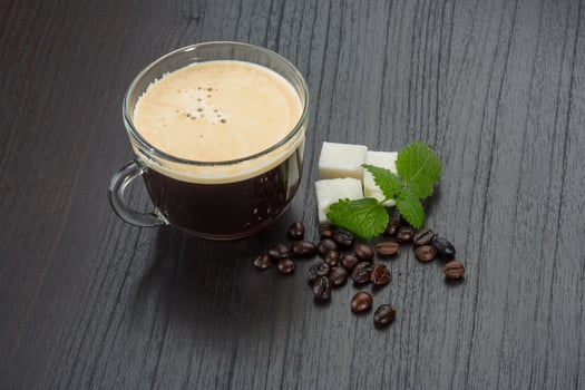 Espresso on wooden background photo