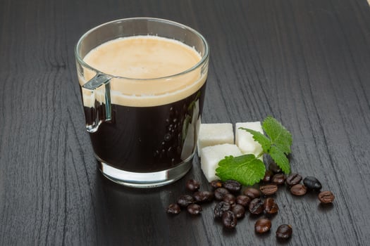 Espresso on wooden background photo