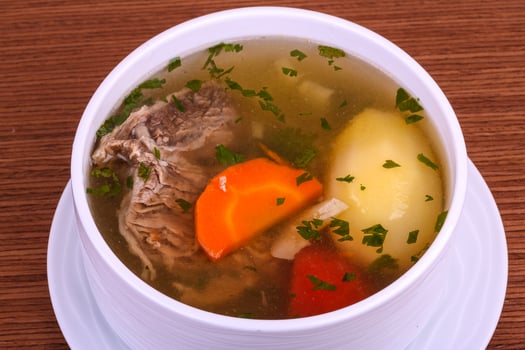 Beef soup with vegetables photo
