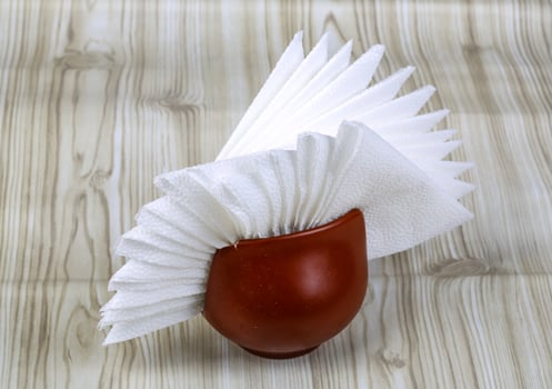 Napkins on wooden background photo