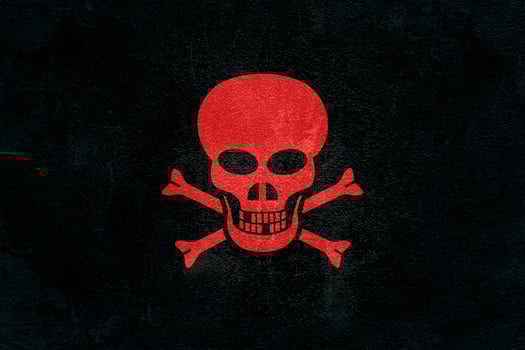 Illustration depicting a red skull on a black asphalt background photo