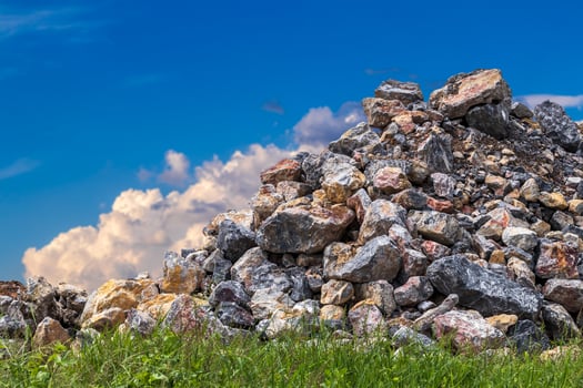 View of granite heaps and sky clouds. photo