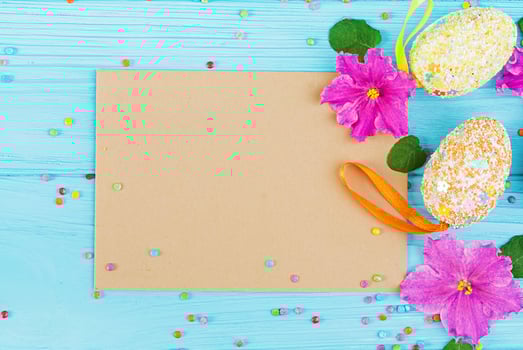 Easter background with flowers and easter eggs. Top view photo