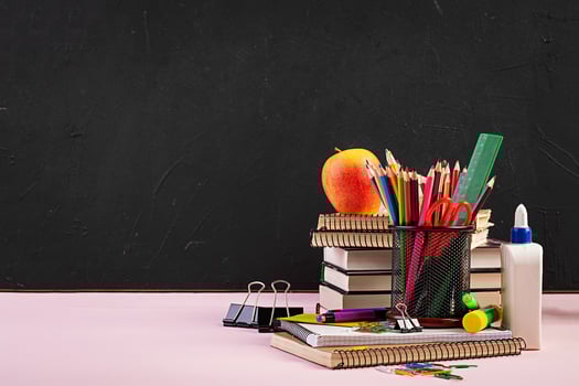 Set of colorful school supplies, books and notebooks. Stationery accessories. photo