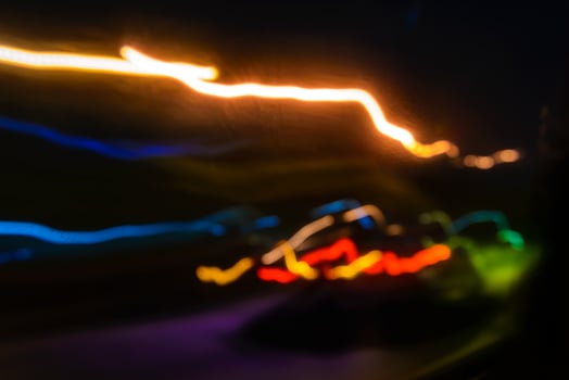abstract motion lights of night traffic in the city photo