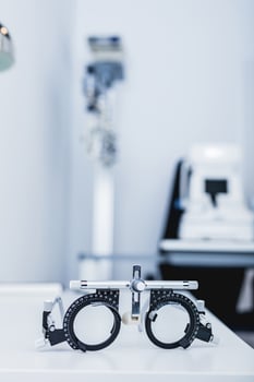 Eye testing glasses in optician's office. photo