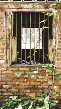 Window of an old abandoned house. Scary. Scary place concept. photo