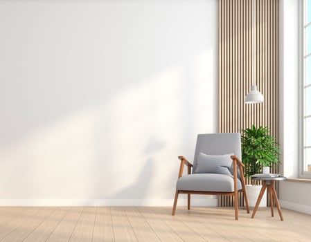 Empty room in minimalist style with armchair and white wall. wooden floor and indoor green plant. 3d rendering photo