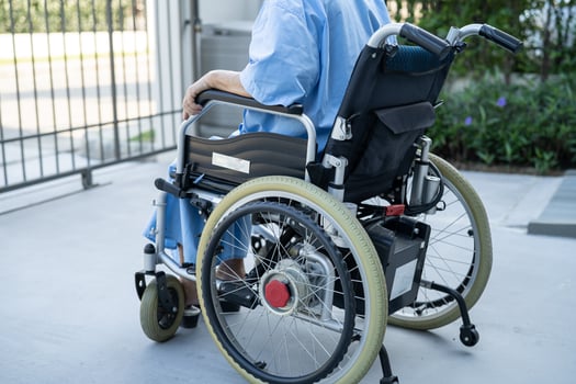 Asian senior or elderly old lady woman patient on electric wheelchair with remote control at nursing hospital ward, healthy strong medical concept photo