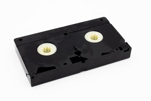 vintage Old analog tape VHS cassette on white backgorund. Retro nostalgia. photo