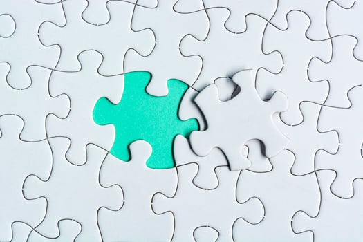 Piece of jigsaw puzzle. Flat lay, Directly above. Copy space. photo