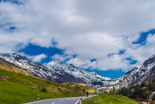 Road amoung snowy Alps mountains, Fluelapass, Davos,  Graubuende photo