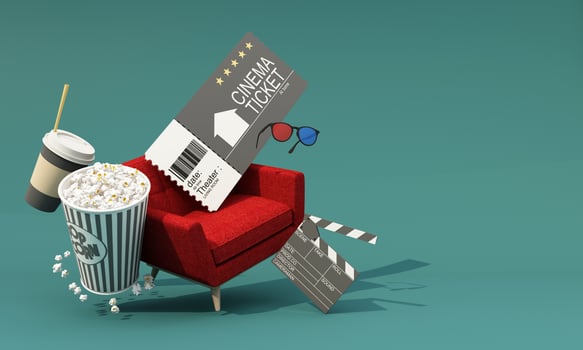 The concept of watching movies online at home during the epidemic Surrounded by movie equipment, movie tickets, film reels, movie cameras Popcorn and drinks with red leather chairs 3d rendering photo