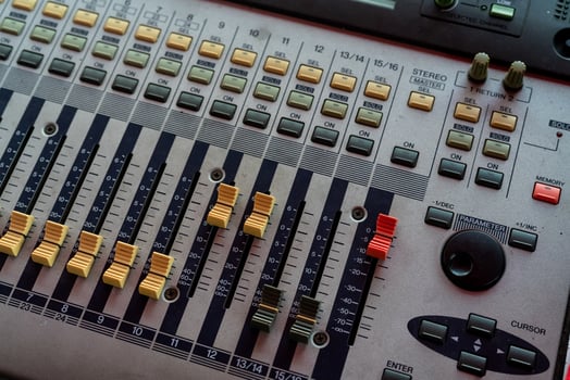 Audio sound mixer console. Sound mixing desk. Music mixer control panel in recording studio. Audio mixing console with faders and adjusting knob. Sound engineer. Sound mixer control radio broadcasting photo