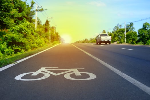Symbol to identify the road for bikes and roads with cars running. photo