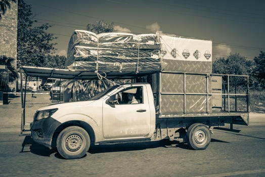 Playa del Carmen Quintana Roo Mexico 2022 Trucks delivery truck and other industrial vehicles in Mexico. photo