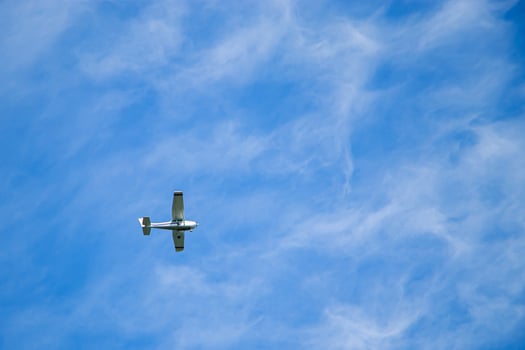 Airplane in the blue sky. Small aircraft for private flights. photo
