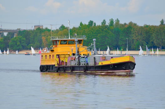 Orange ship in Volga river, Yaroslavl, Russia photo
