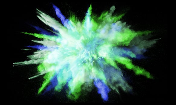 Colorful powder explosion, isolated on black background photo