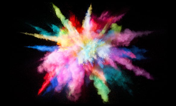 Colorful powder explosion, isolated on black background photo