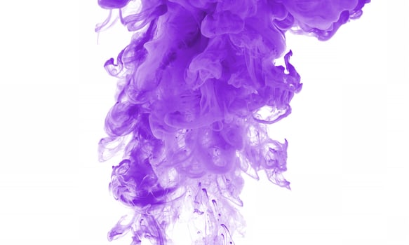Purple color paint in water photo