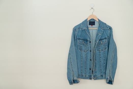 jacket jean hanging with wood hanger photo