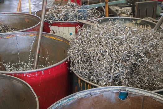 Closeup twisted spiral steel scarp, recycle metal for industry background photo