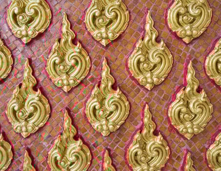 Golden floral pattern in the traditional Thai style. photo