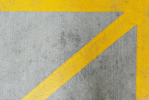 Cement street and yellow line. photo