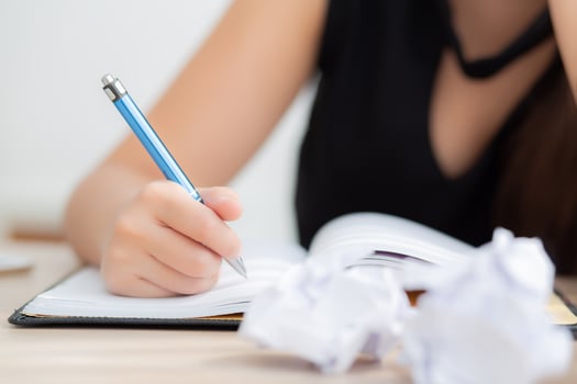 Closeup hand asian woman writer thinking idea and writing on notebook or diary with happy on desk office, lifestyle of asia girl is success, female planning working, education and business concept. photo