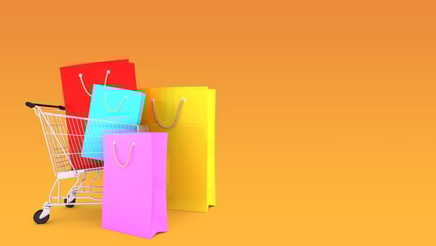 Colourful paper shopping bags on shopping cart with Orange Background., shopping lover or shopaholic concept, 3D rendering. photo