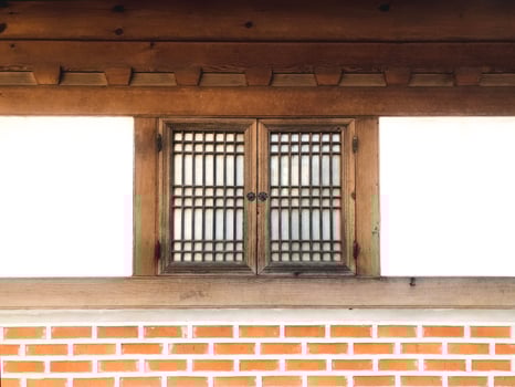 Small wooden window in traditional Korean house photo