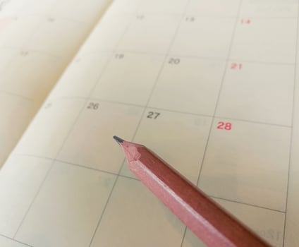 Pencil on the calendar planner. photo