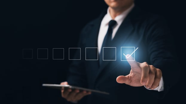 Businessman touching squares with the right meaning, business concept. photo