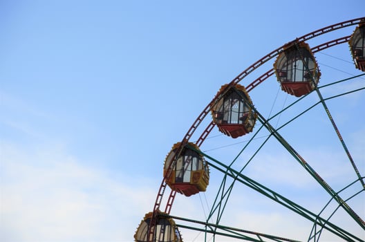 part of the Ferris wheel against the blue sky. Attraction. geometric background photo