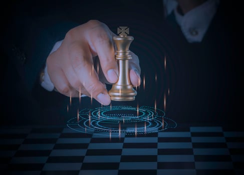 Businessman holding and throwing golden king chess to target for business winner with successfully in the competition with technology network background. Management and leadership strategy concept. photo
