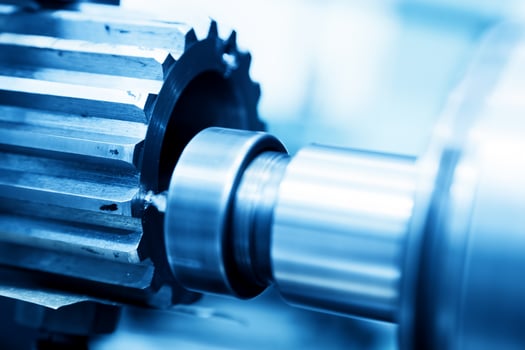 CNC turning, drilling and boring machine at work close-up photo